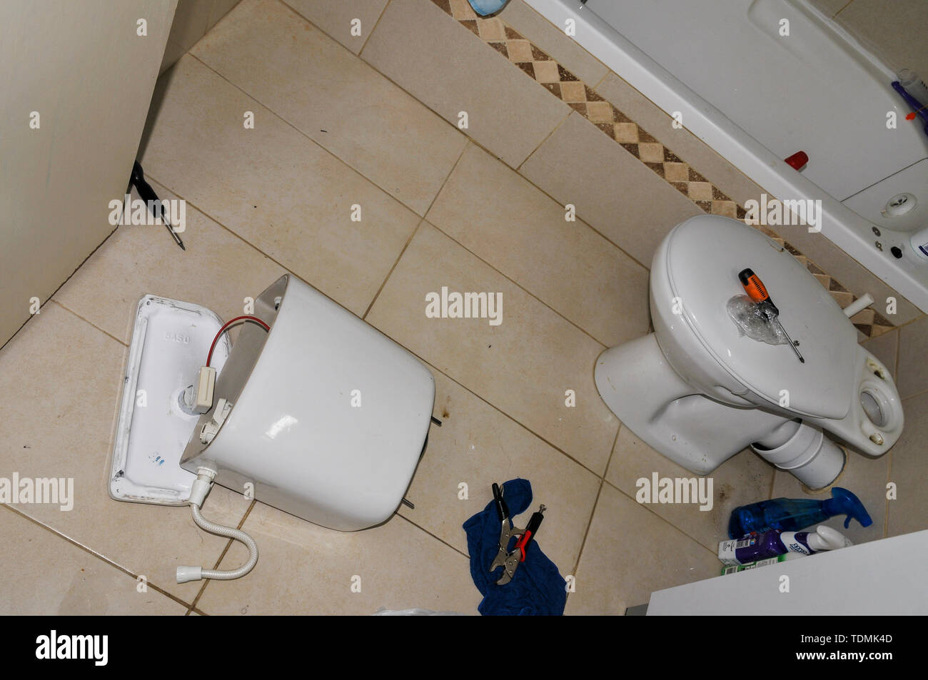 Home care and do it yourself. Fixing a toilet cistern at home Stock Photo