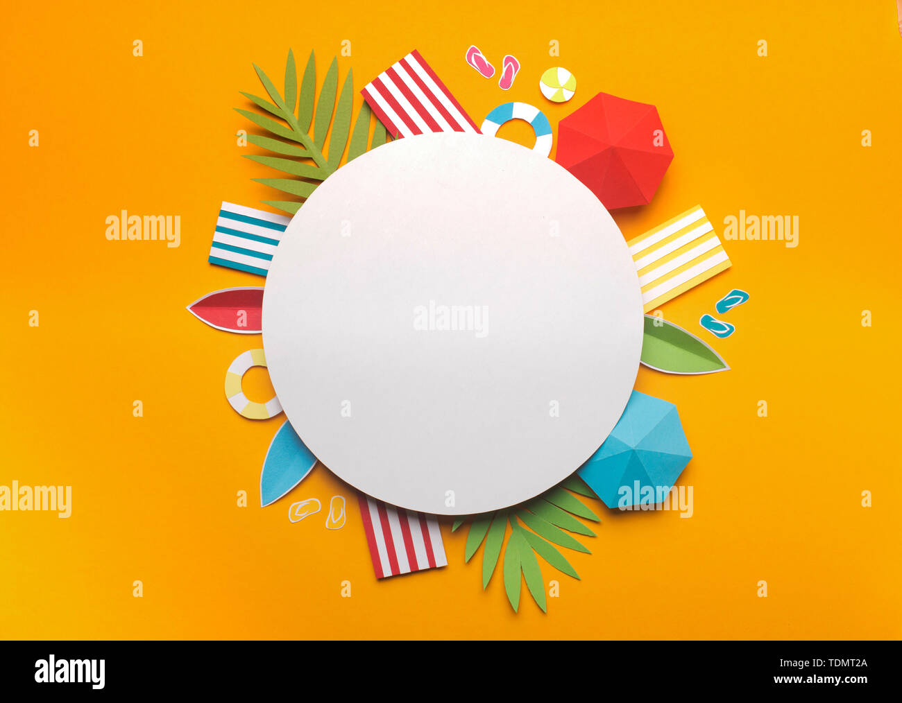 Composition of beach accessories on yellow background Stock Photo