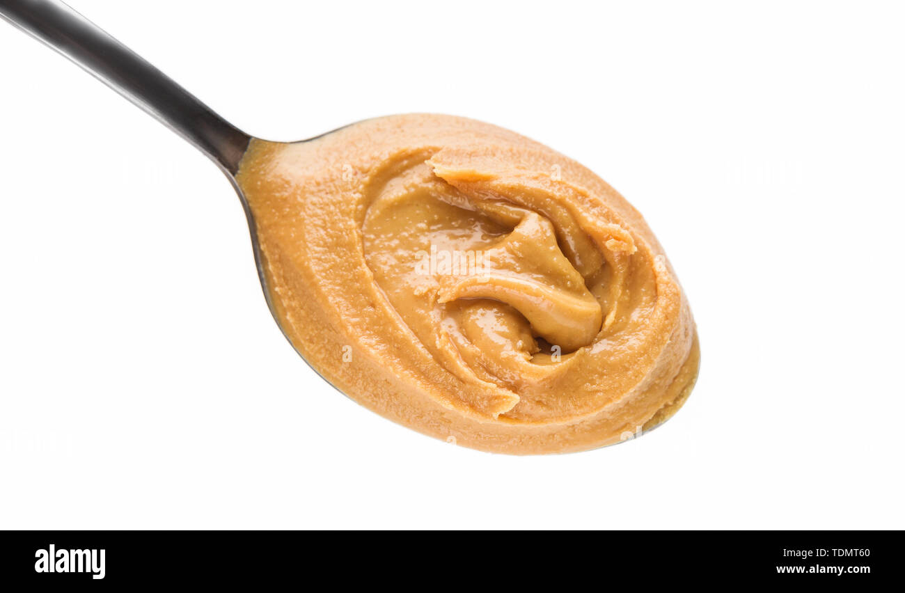 Peanut spread in spoon Stock Photo