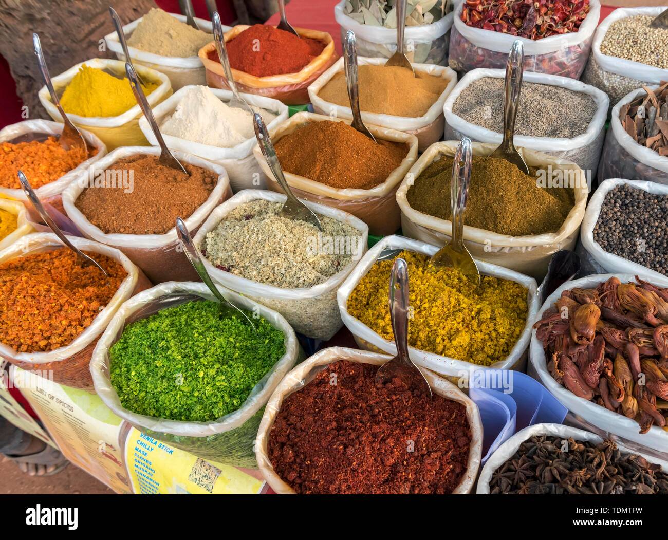Sacks of spices, herbs and curry powders on display at Anjuna Beach Flea Market, Goa, India Stock Photo