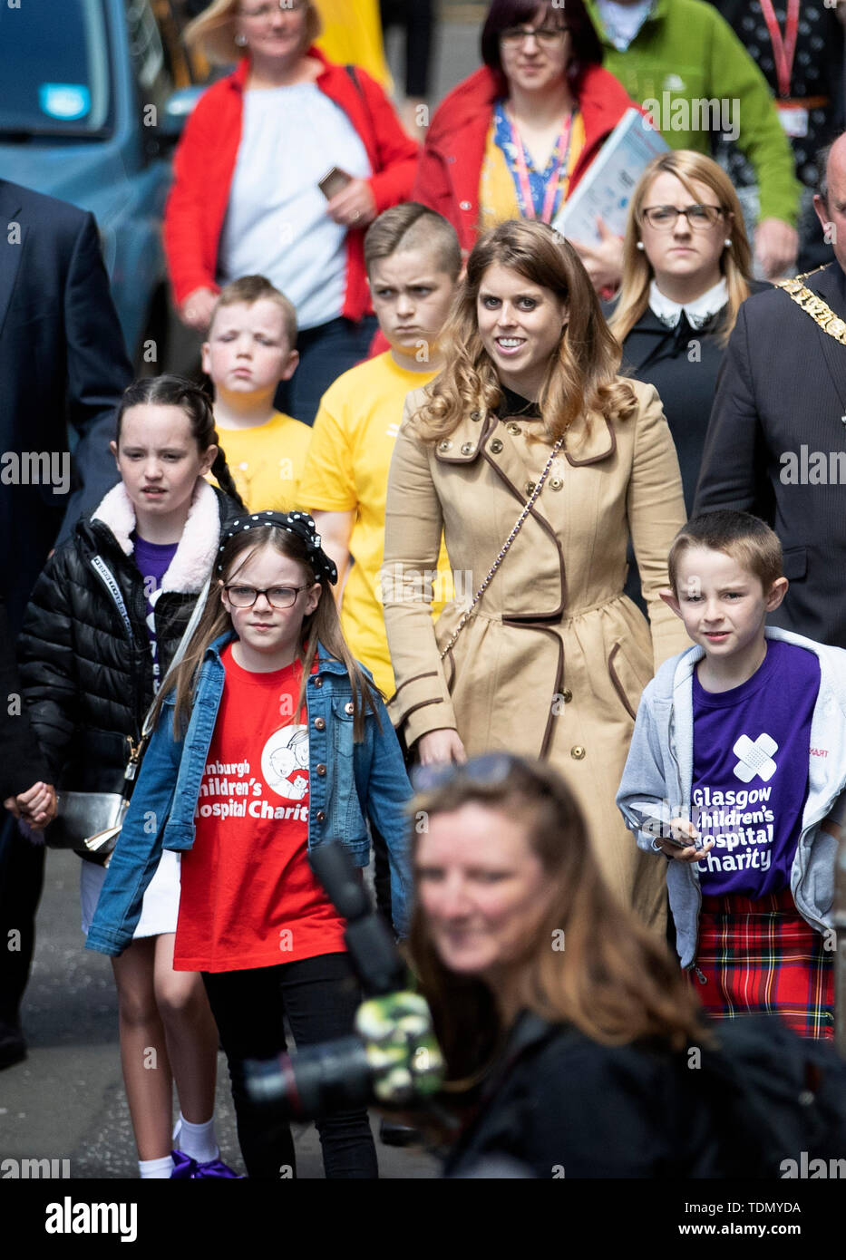 Princess Beatrice walks down Edinburgh's Royal Mile with children from Scotland's children's hospital charities as she takes part on the Oor Wullie's Big Bucket Trail to find one of several life-sized sculptures of the favourite comic book character on a public art trail in the city. Stock Photo