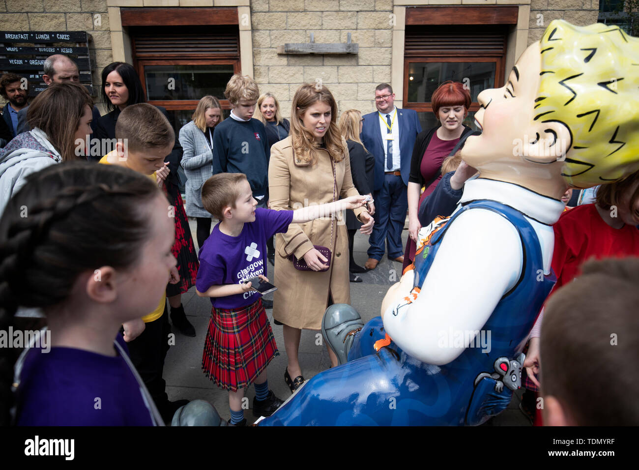 Princess Beatrice joins children from Scotland's children's hospital charities as she takes part in the Oor Wullie's Big Bucket Trail to find one of several life-sized sculptures of the favourite comic book character on a public art trail in Edinburgh city centre. Stock Photo