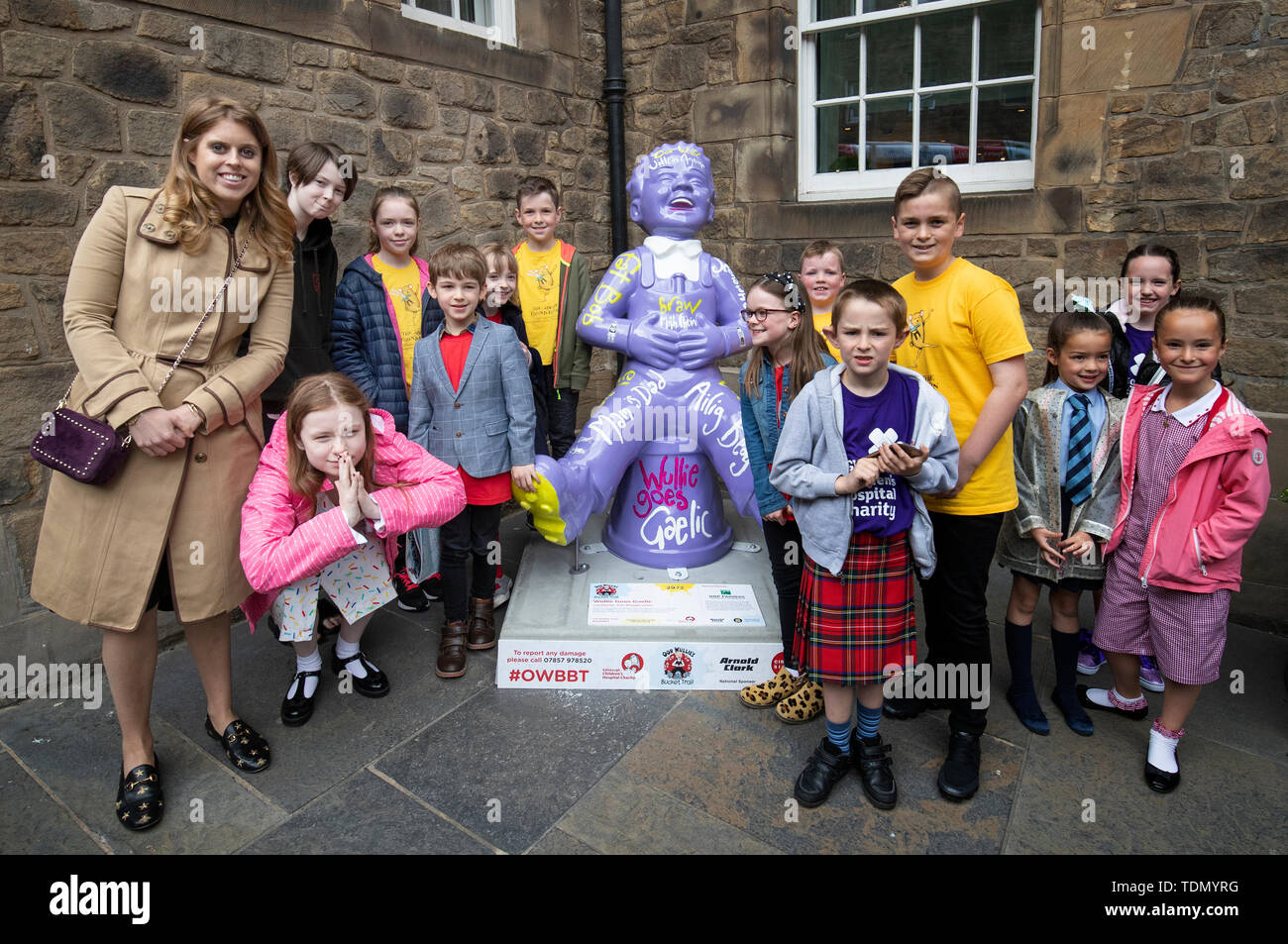 Princess Beatrice (left) joins children from Scotland's children's hospital charities as she takes part in the Oor Wullie's Big Bucket Trail to find one of several life-sized sculptures of the favourite comic book character on a public art trail in Edinburgh city centre. Stock Photo