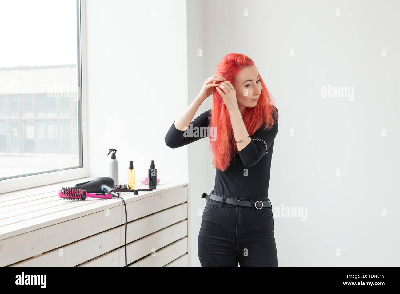 Beautiful Red Haired Girl With Long Hair She Is Weaves A Braid