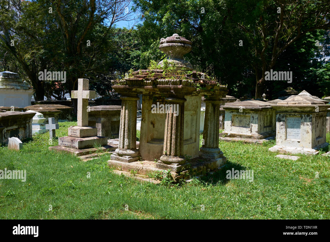 Graves in an old Protestant cemetery in Town, Penang, Malaysia