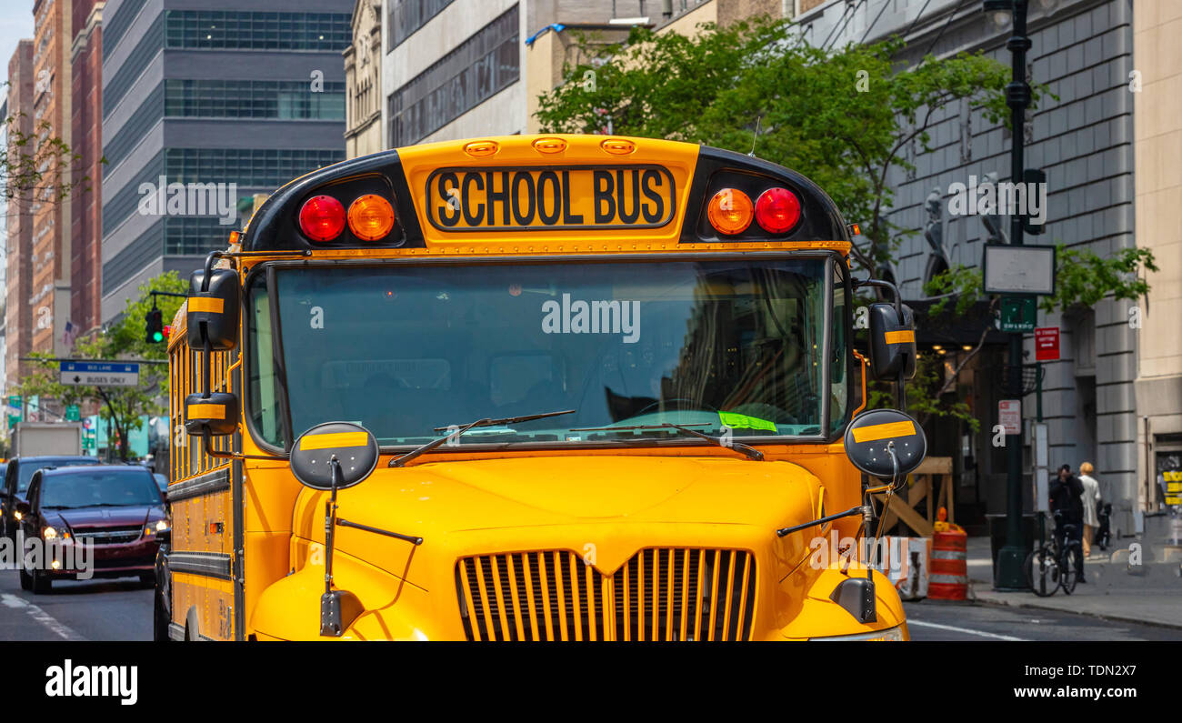 School bus, New York. Yellow classic public bus on the street ...