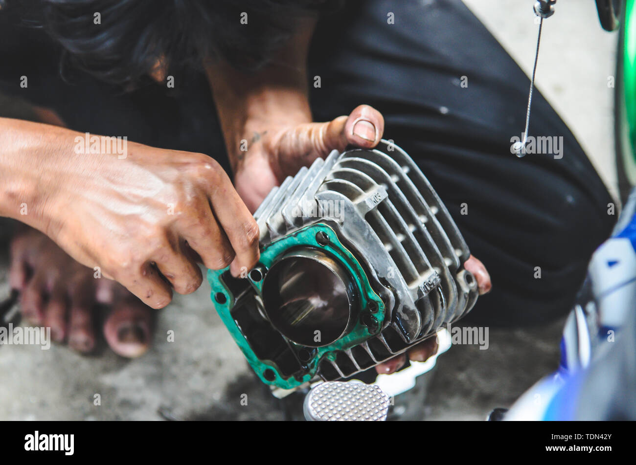 Mechanical repairs engine motorcycle Stock Photo Alamy