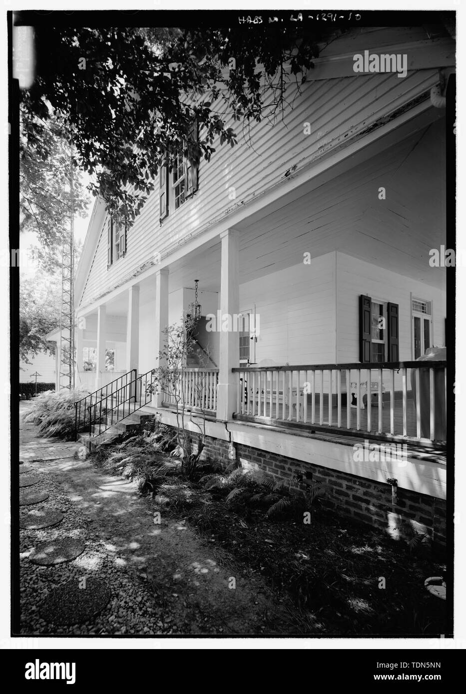 Perspective view of east elevation looking from the northeast to show stair to second floor - Beau Fort, 4055 State Highway 494, Natchez, Natchitoches Parish, LA; Prudhomme, Narcisse; Cloutier family; Louisiana Tech University School of Architecture, sponsor; Carwile, Guy W, faculty sponsor; Morgan, Nancy I, M, sponsor; Cane River National Heritage Area Commission, sponsor; Price, Virginia Barrett, transmitter; Austin, Mandi, delineator; Carter, Jessica, delineator; Cooper, Christopher, delineator; Dillehay, Shannon, delineator; Harris, Christopher, delineator; Lesur, Rene, delineator; Linzay, Stock Photo