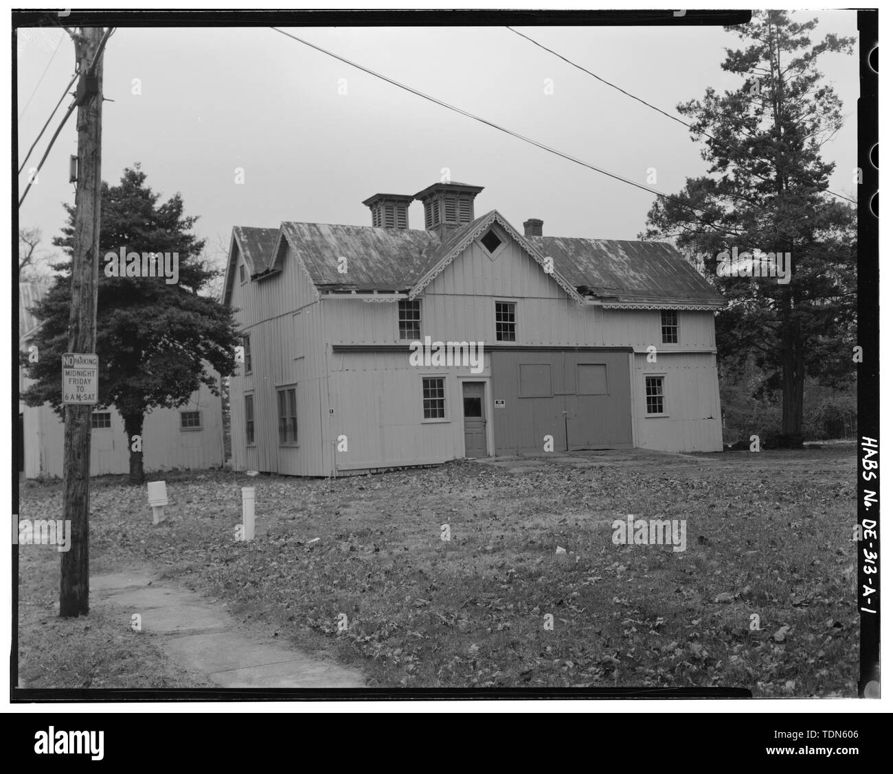 Perspective view of north (front) and east elevations, looking south