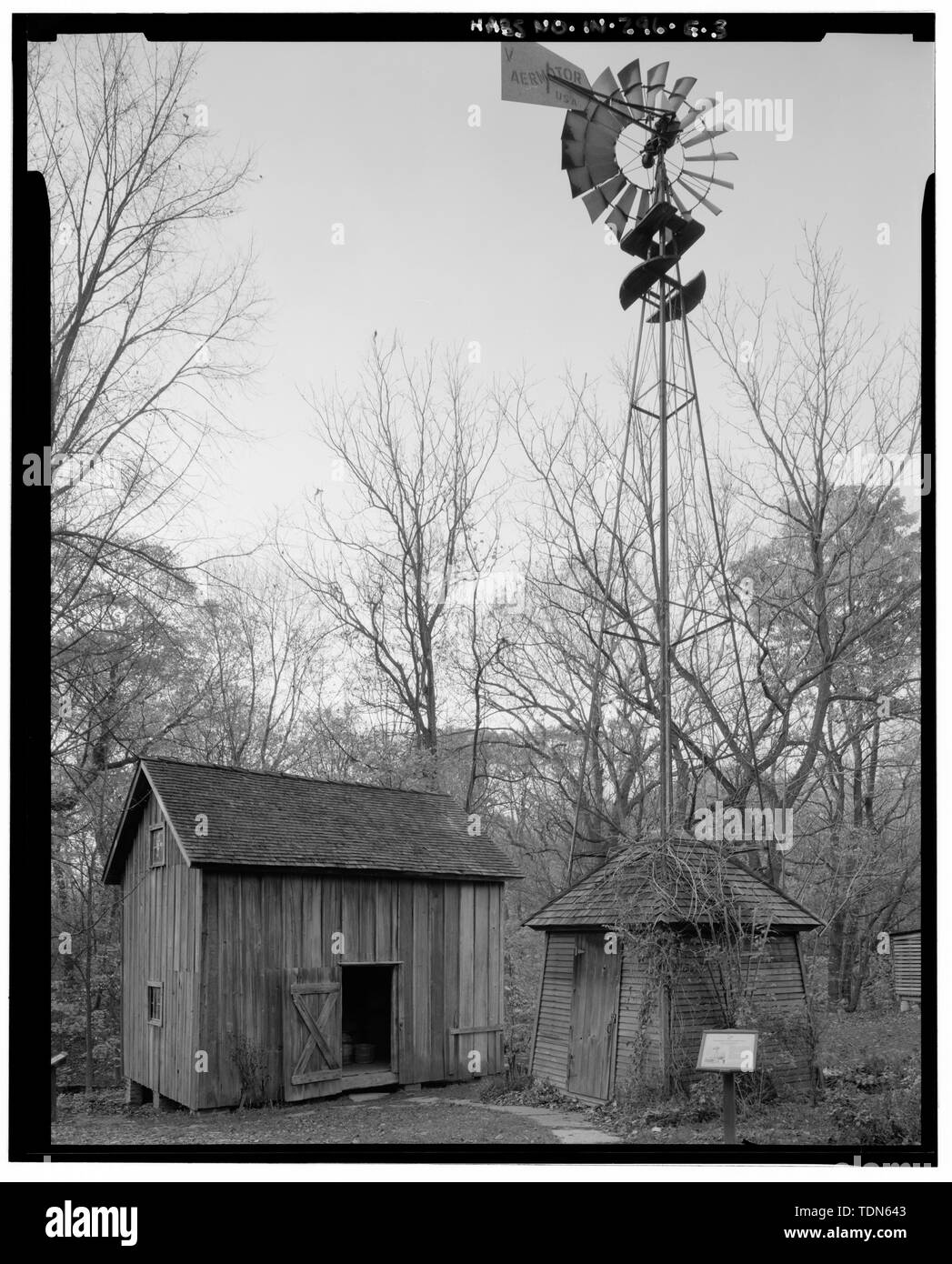 Perspective view of pumphouse and windmill and granary taken from the
