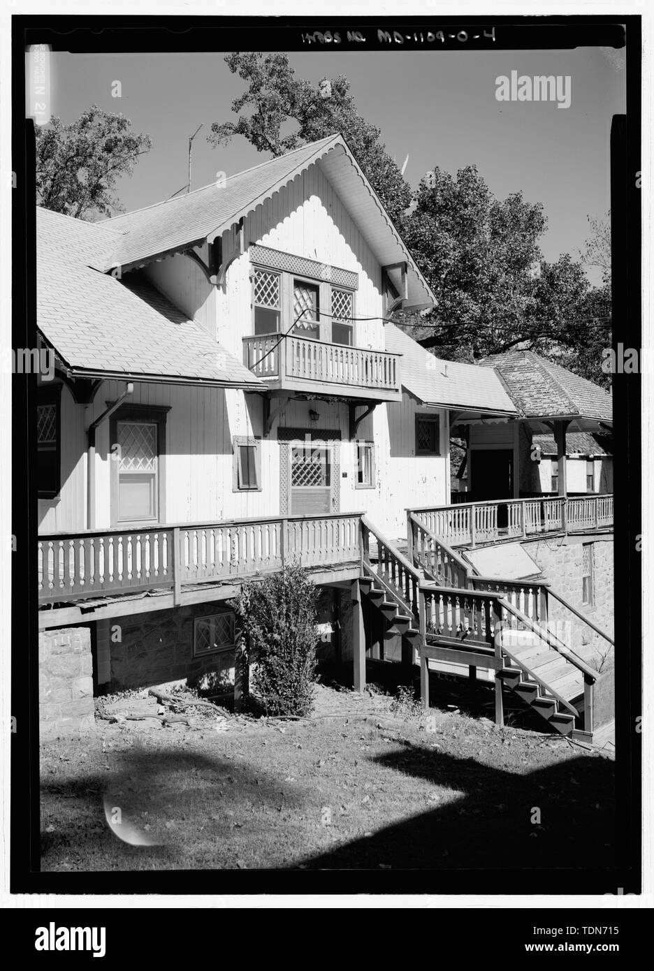 Perspective view, looking from the south, of the front elevation - National Park Seminary, Swiss Chalet, 2802 Woodstock Avenue, Silver Spring, Montgomery County, MD; Beta Eta Theta sorority; Ament, James E; Price, Virginia B, transmitter; Ott, Cynthia, historian; Boucher, Jack E, photographer; Lavoie, Catherine C, project manager; Price, Virginia B, transmitter; Price, Virginia B, transmitter; Lavoie, Catherine C, project manager Stock Photo