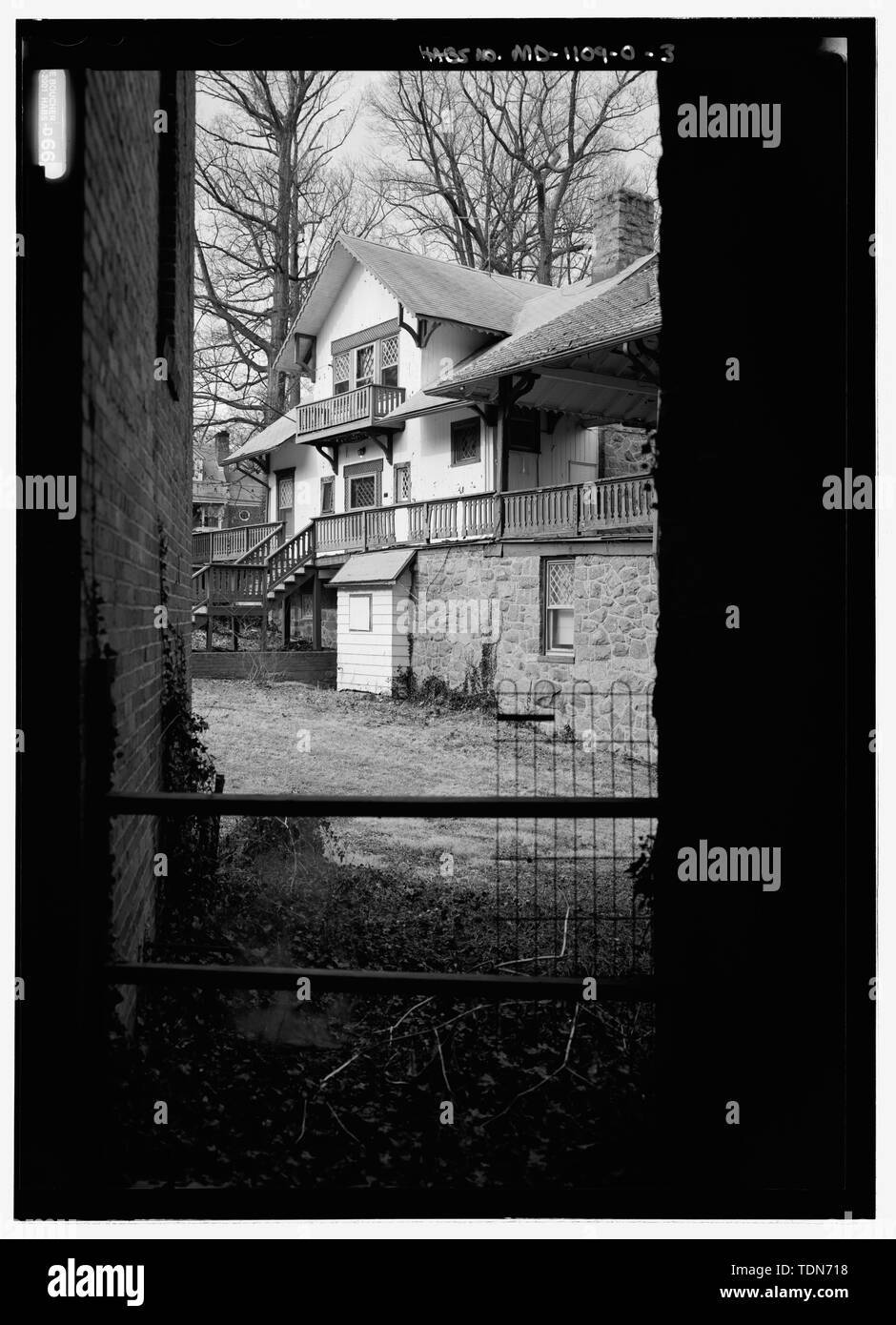 Perspective view, looking through tunnel to the west towards the Chalet - National Park Seminary, Swiss Chalet, 2802 Woodstock Avenue, Silver Spring, Montgomery County, MD; Beta Eta Theta sorority; Ament, James E; Price, Virginia B, transmitter; Ott, Cynthia, historian; Boucher, Jack E, photographer; Lavoie, Catherine C, project manager; Price, Virginia B, transmitter; Price, Virginia B, transmitter; Lavoie, Catherine C, project manager Stock Photo