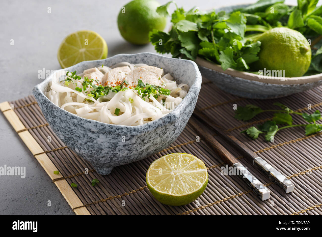 Traditional vietnamese noodle soup Pho in a bowl. Asian food concept. Stock Photo