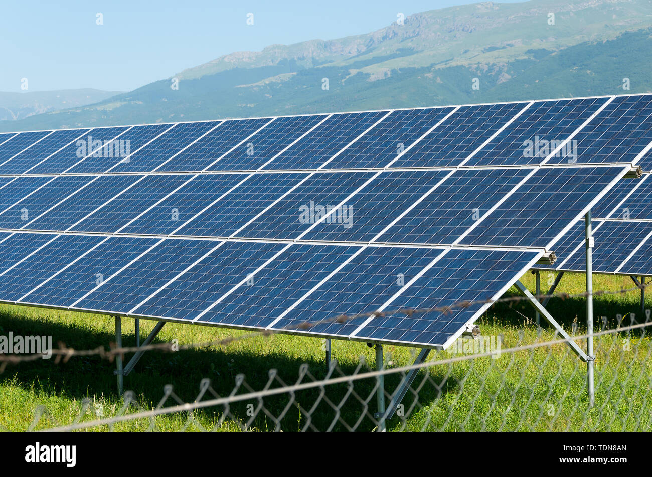 Concept clean energy power in nature. Renewable energy solar modules Stock Photo
