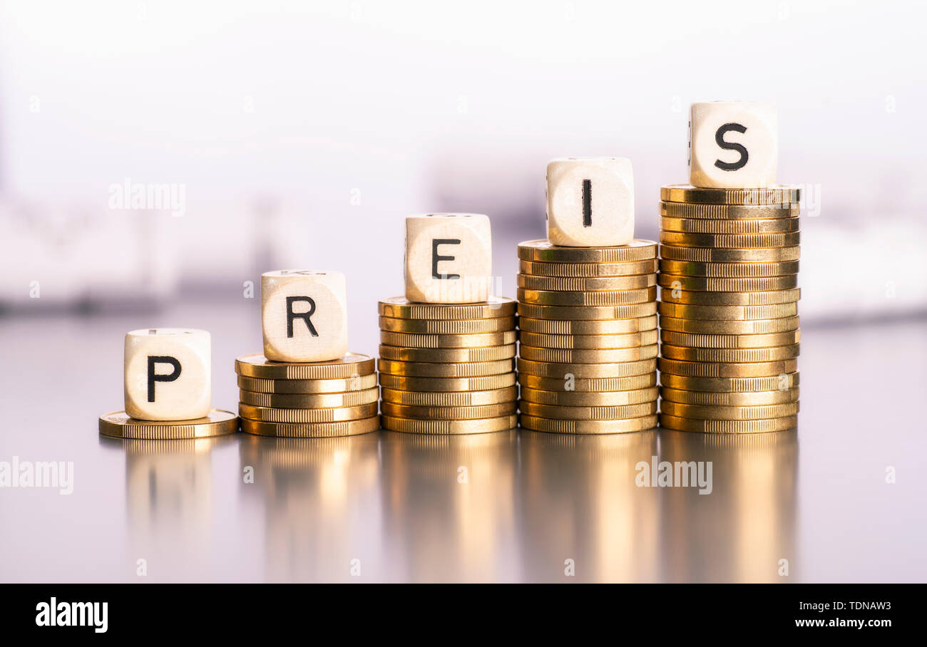 Rising stacks of coins with the word Price Stock Photo