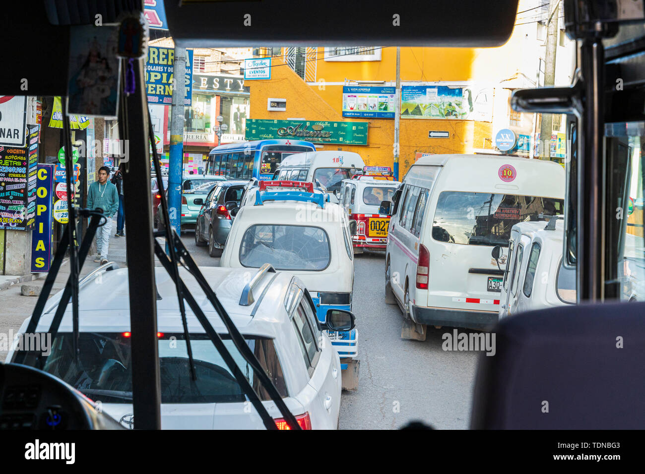 Traffic in Juliaca viewed from a bus, Peru, South America Stock Photo