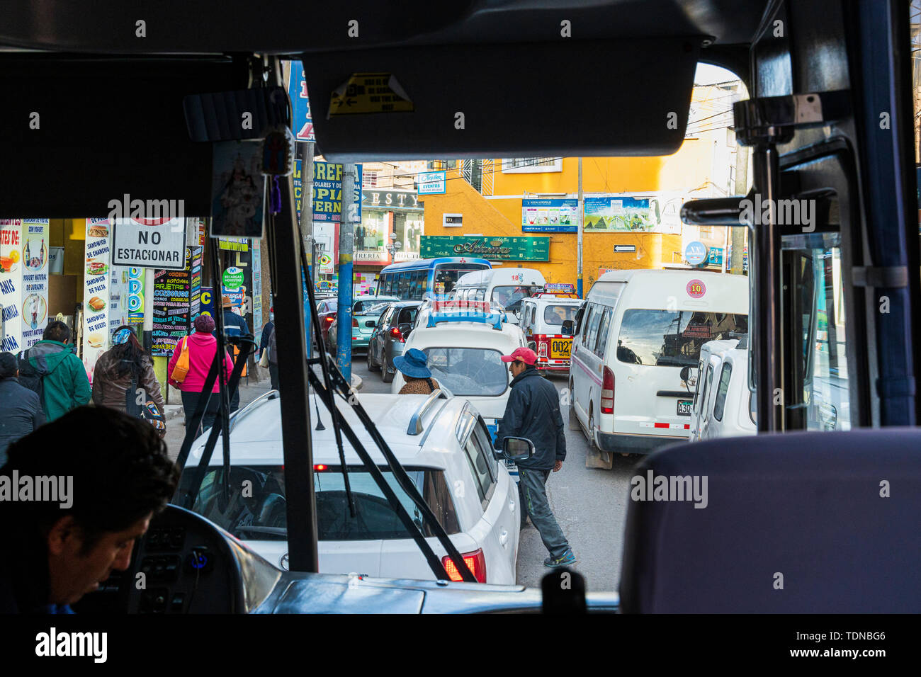Traffic in Juliaca viewed from a bus, Peru, South America Stock Photo