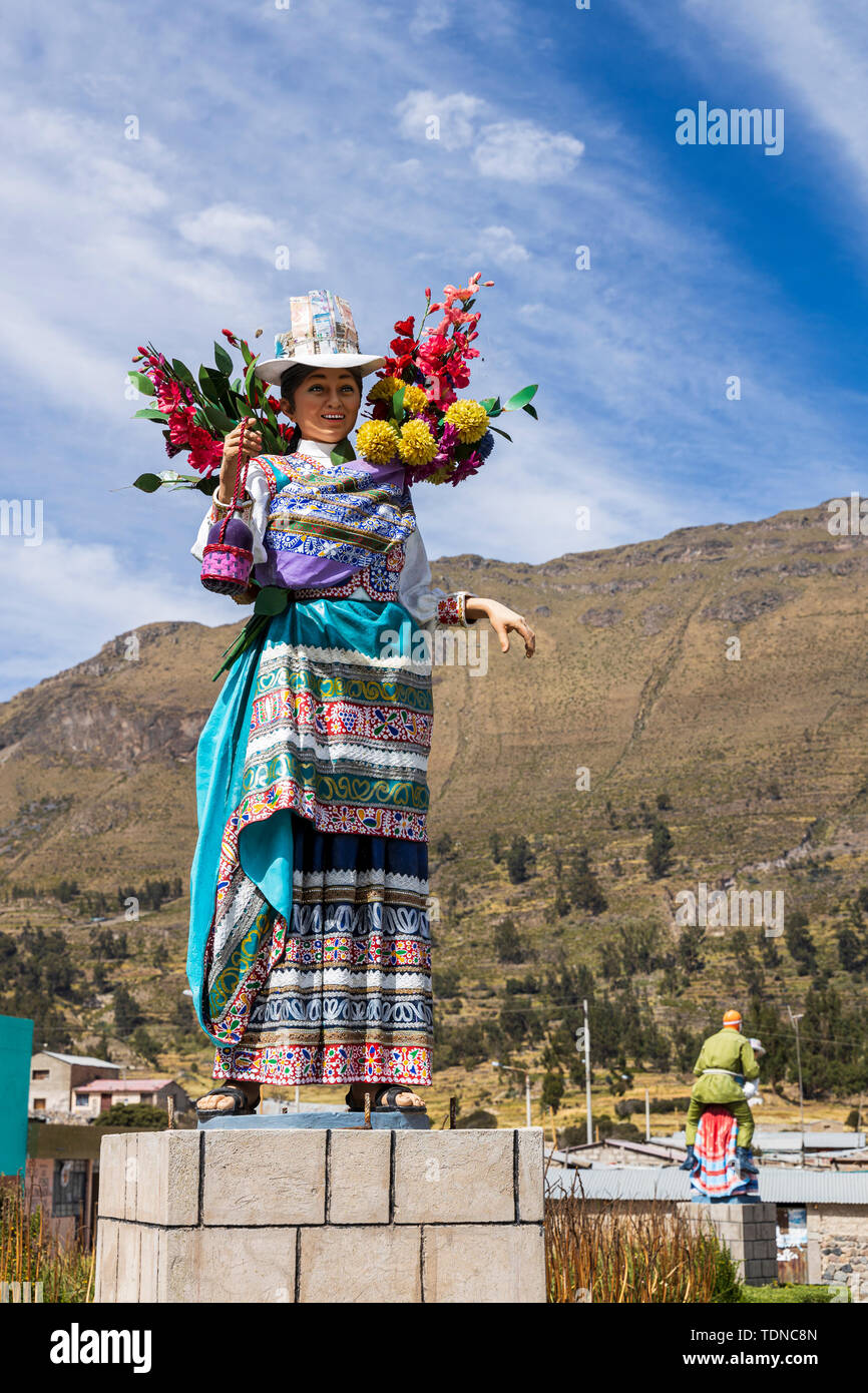 Statues of traditional dancers in the plaza at Maca, Colca Canyon, Peru