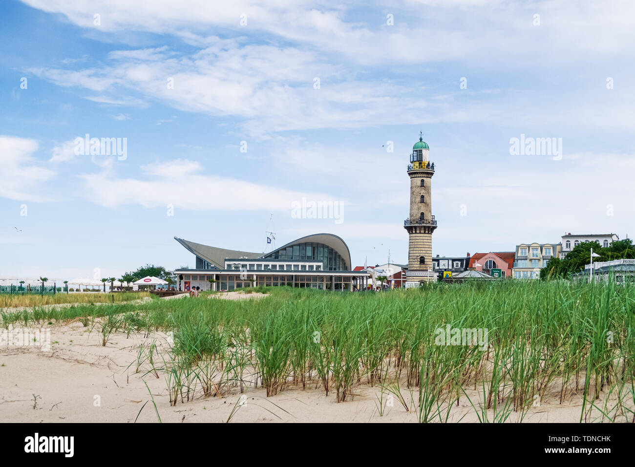 06-16-2019 Warnemunde, Rostock, Germany: Lighthouse against blue sky on sunny summer day Stock Photo