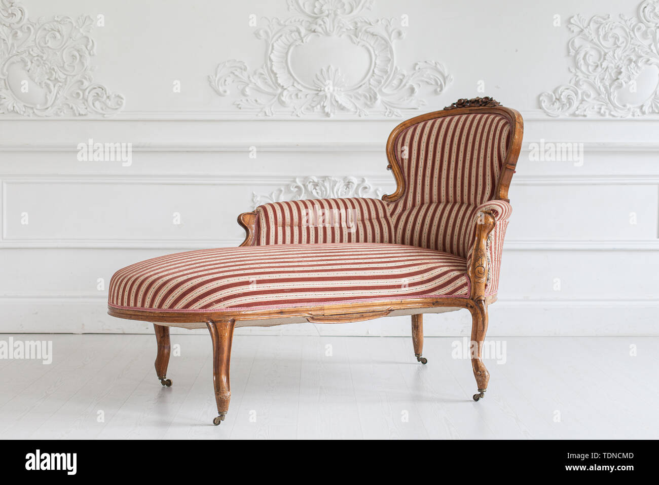 Vintage Sofa With Wood Carvings In A Luxurious Light