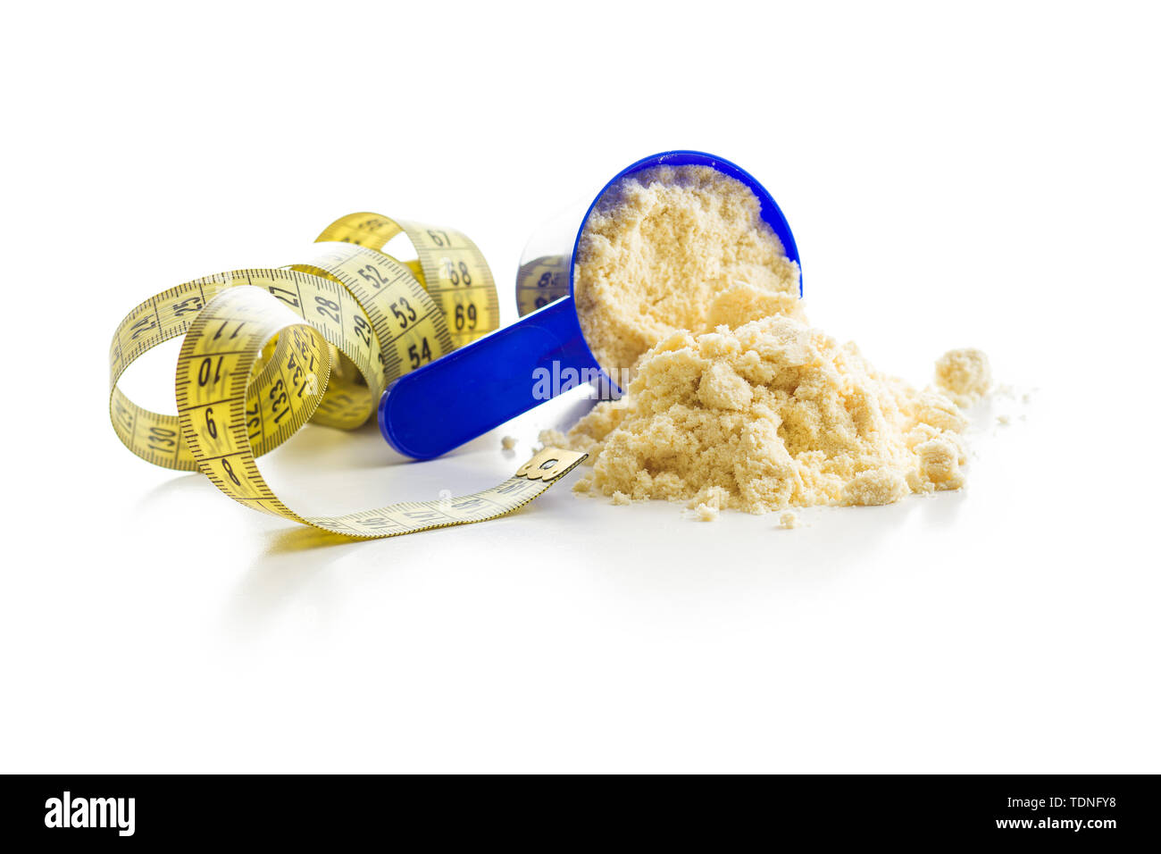 Whey protein powder in scoop isolated on white background Stock Photo