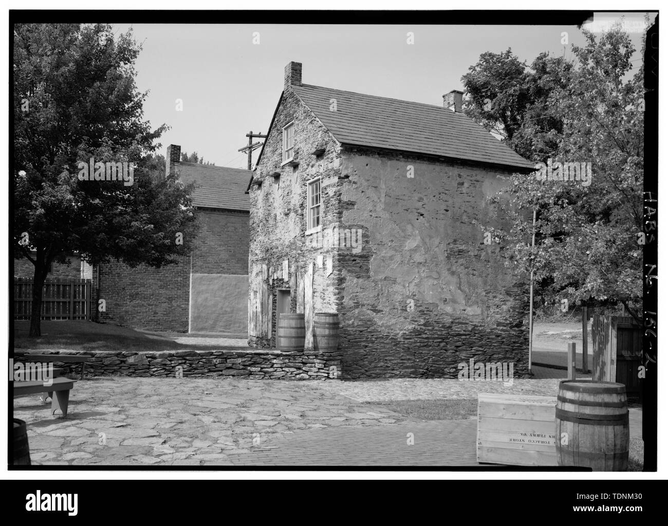 Perspective view from south, showing rear and southeast side walls