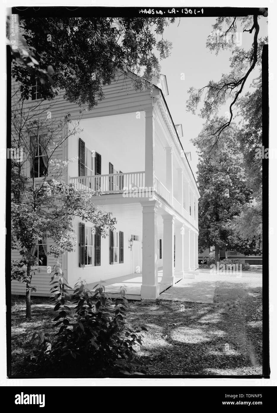 Perspective view looking from the southeast to show front porch -  Prudhomme-Rouquier House, 446 Jefferson Street, Natchitoches, Natchitoches  Parish, LA; Roquier, Francois; Prudhomme, Marie Louise; Carr, John C;  Rouquier, Marie Louise, Henrietta;