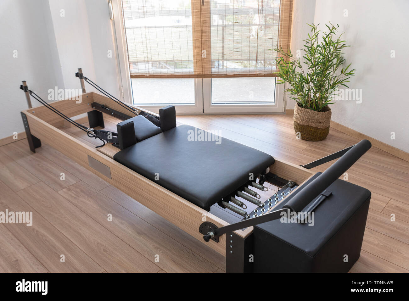 Pilates studio room with reformer beds Stock Photo Alamy