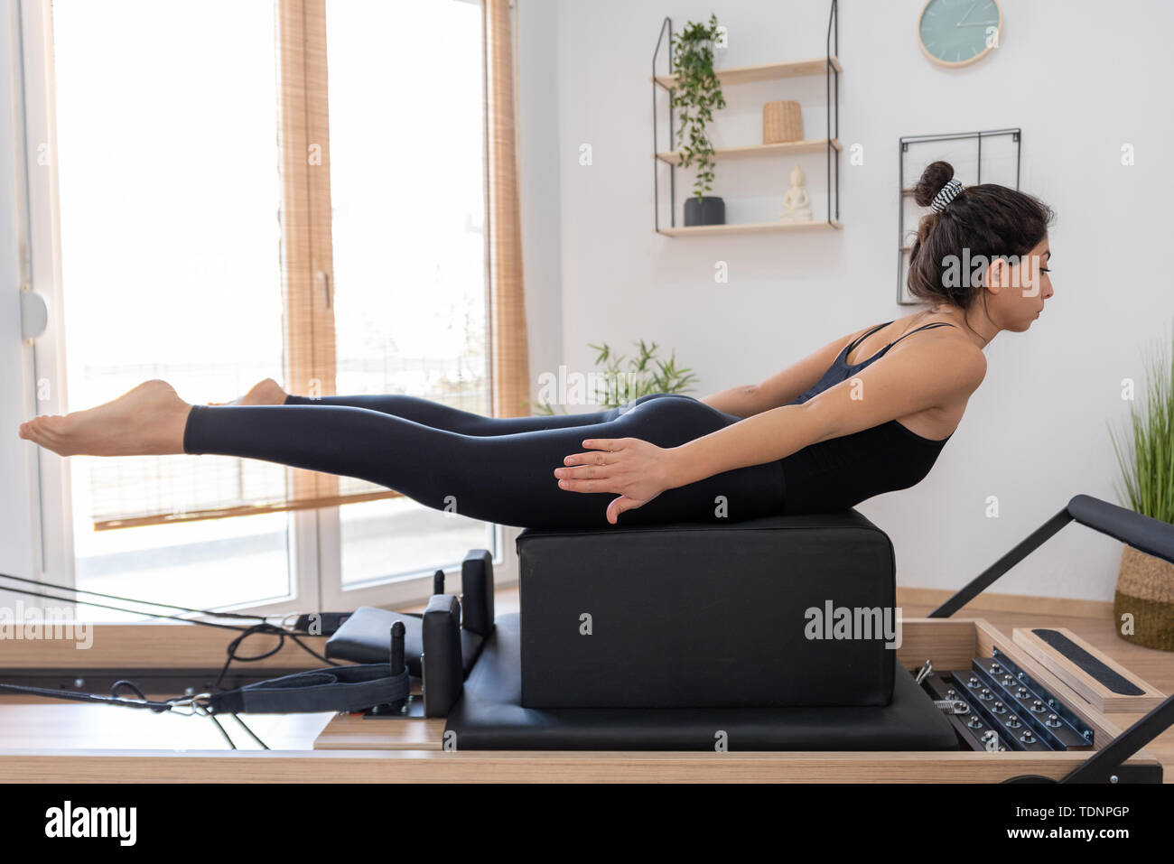 Reformer bed pilates woman hi-res stock photography and images - Page 3 -  Alamy