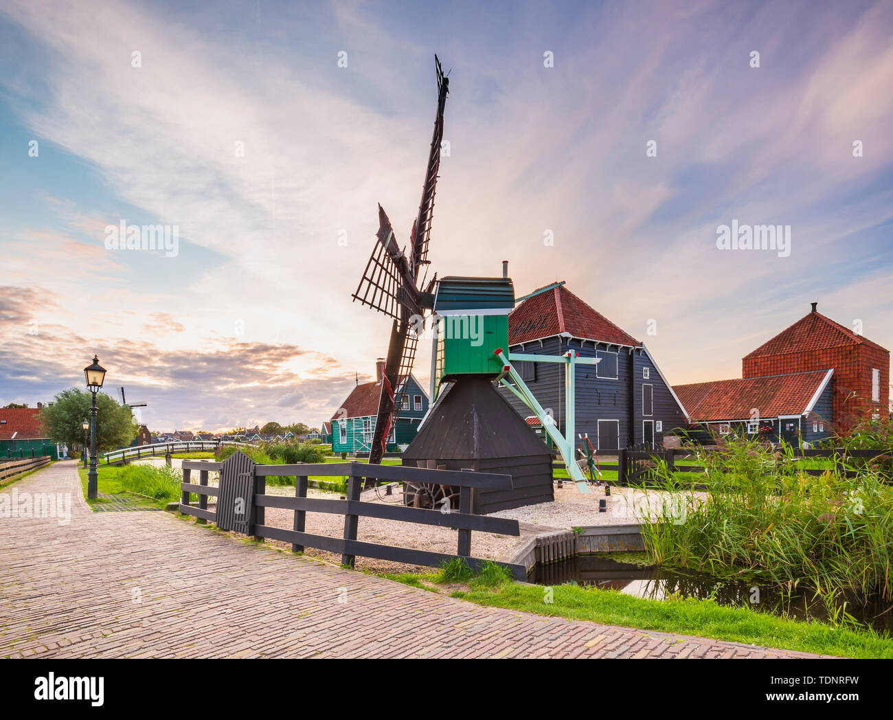 Typically traditional Dutch house, windmill, historical architecture ...