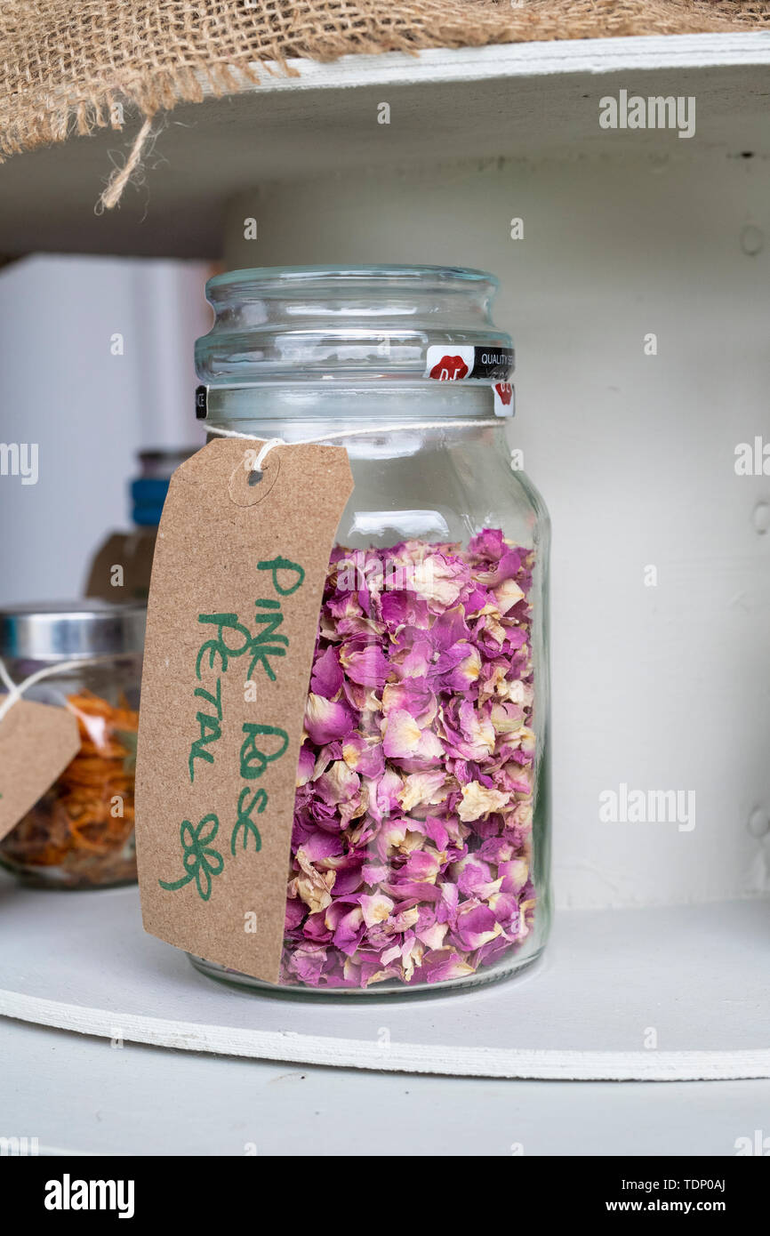 Dried rose petals in storage jar – License Images – 11233217