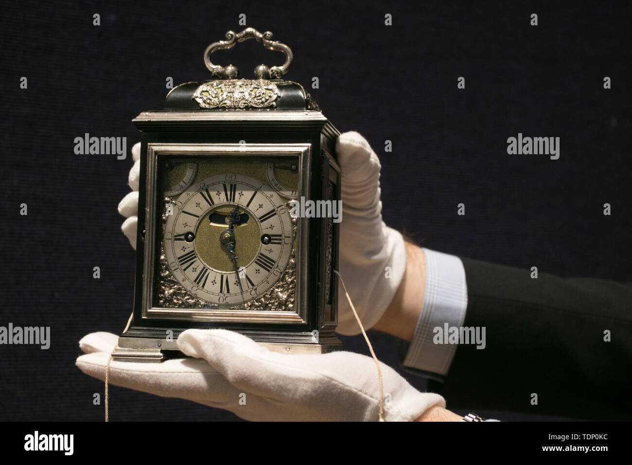 The King William & Queen Mary Royal Tompion table clock made by master clockmaker Thomas Tompion for Queen Mary II in 1693, one of the most valuable clocks featured  in the World's Most valuable clocks from the Clive Collection and is expected to fetch in excess of GBP 2,000,000 is to appear at auction at Bonhams New Bond Street in London. Stock Photo