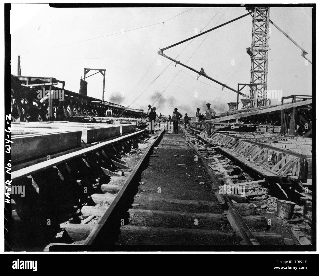 Photocopy of historic photograph of construction plant in operation, ca. 1917-19. From the Joseph E. Stimson Collection, Wyoming State Archives Museum and Historical Department. VIEW BETWEEN TRESTLES 5 AND 6, LOOKING SOUTH - Rock River Union Pacific Snowshed Plant, .6 Mile North of Rock River, Rock River, Albany County, WY; Union Pacific Transcontinental Railroad; Wyoming State Highway Department Stock Photo