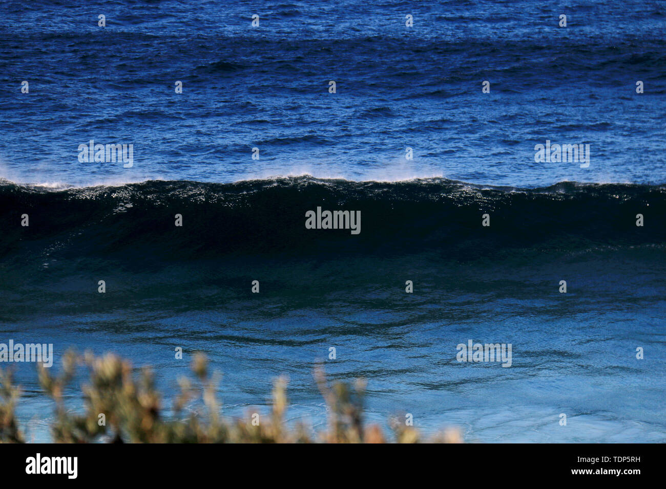 Grumpy Wave Turbulent impact on the beach hi-res stock photography and images - Alamy