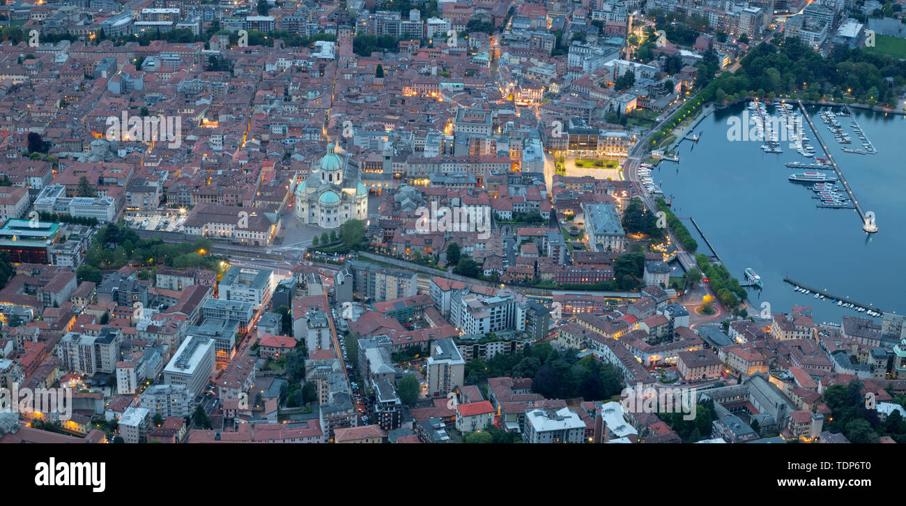 Como - The city with the Cathedral and lake Como at dusk. Stock Photo