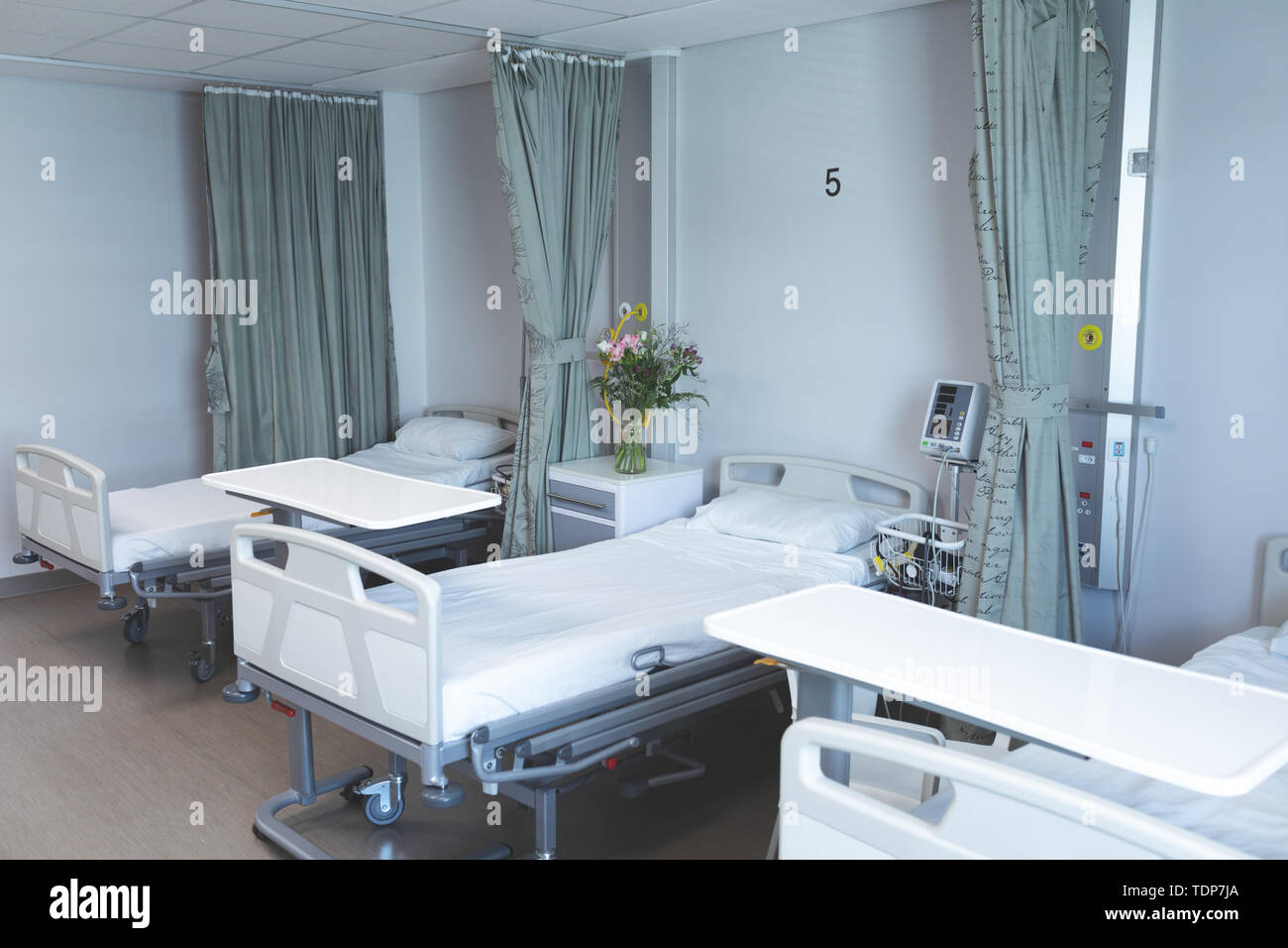 Hospital ward with empty beds Stock Photo