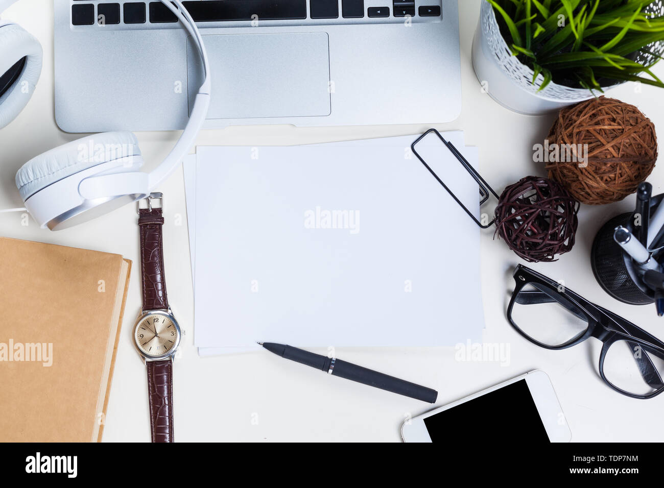 White office desk table with a lot of things on it. Top view Stock ...