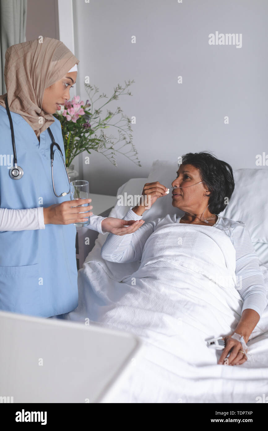 Mature female doctor young hi-res stock photography and images - Alamy