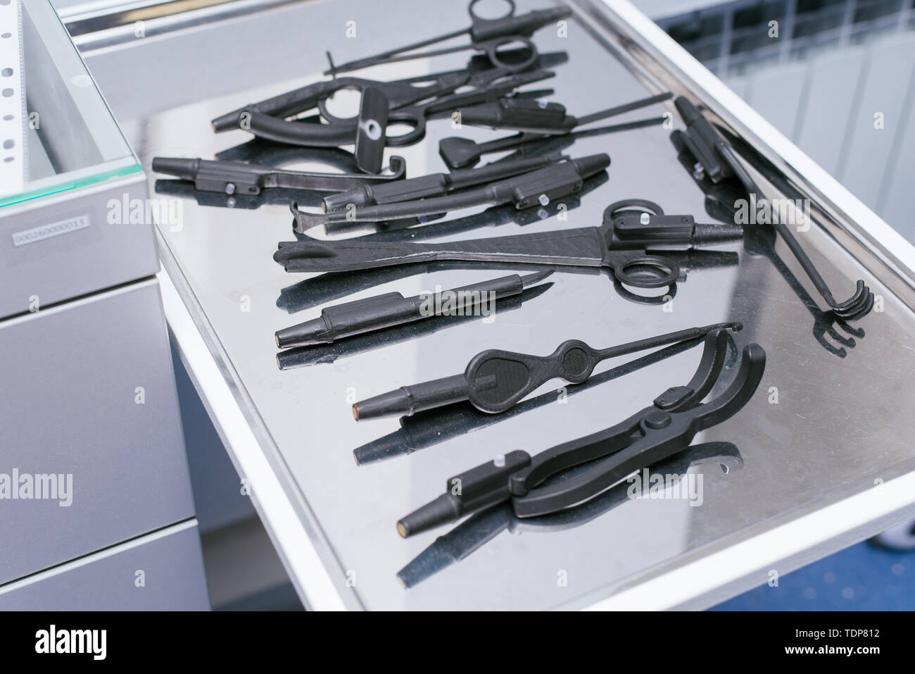 Unnatural medical instruments and accessories for virtual surgery. Plastic forceps, clamps, medical devices for 3D operations. Education of medical un Stock Photo