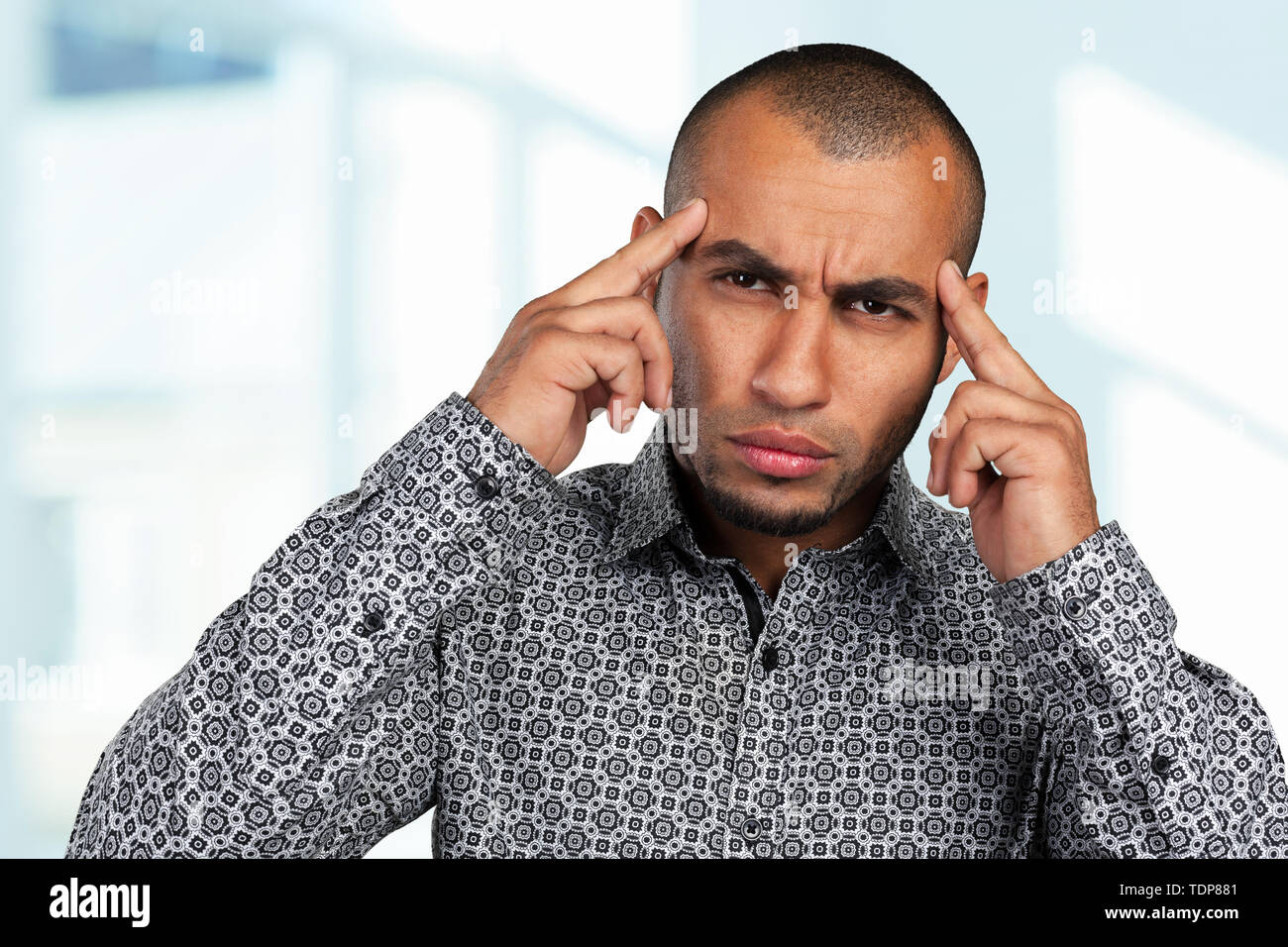 Handsome business man with a depressed expression Stock Photo - Alamy