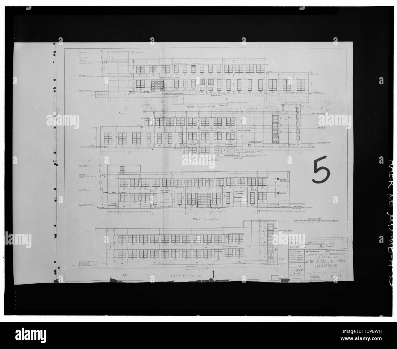 Photocopy of drawing (original in possession of Naval Surface Warfare Center Carderock Division, Bethesda, MD) WIND TUNNEL BUILDING, ELEVATIONS, 1941 - Naval Surface Warfare Center, Subsonic Wind Tunnel Building, Bounded by Clara Barton Parkway and McArthur Boulevard, Silver Spring, Montgomery County, MD; U.S. Department of the Navy; R. Christopher Goodwin and Associates, Incorporated, contractor; Melhuish, Geoffrey Eden, project manager; Wise, Harriet, photographer Stock Photo