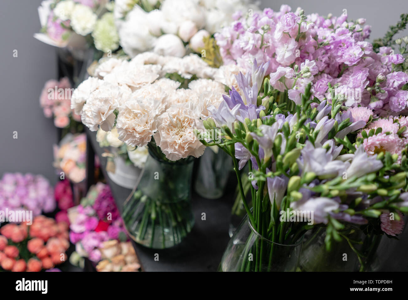 Vases With Different Colored Flowers Showcase Flower Shop