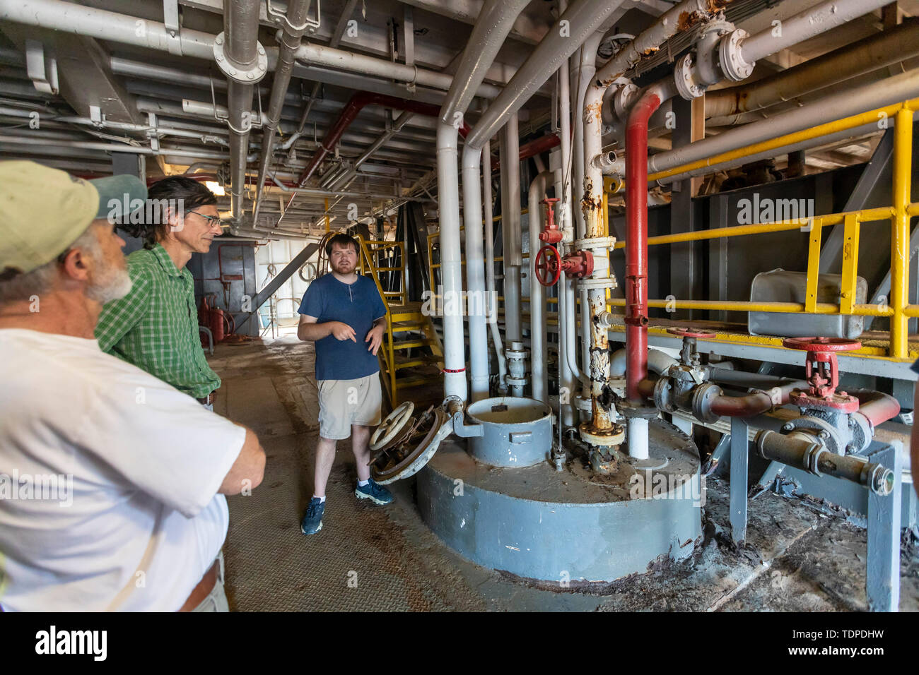 Morgan City, Louisiana - Visitors tour the 'Mr. Charlie' offshore oil drilling rig, now a tourist attraction and training facility. 'Mr. Charlie' was  Stock Photo