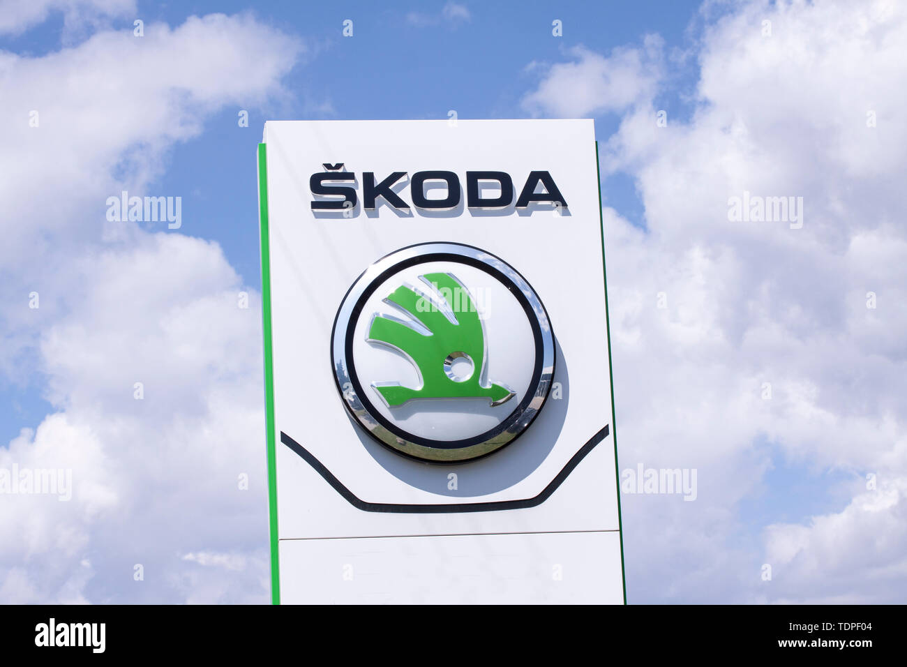 Sign with the logo of Škoda. Czech automobile manufacturer. In 2000 Škoda became a wholly owned subsidiary of the Volkswagen Group. Copenhagen, Denmar Stock Photo
