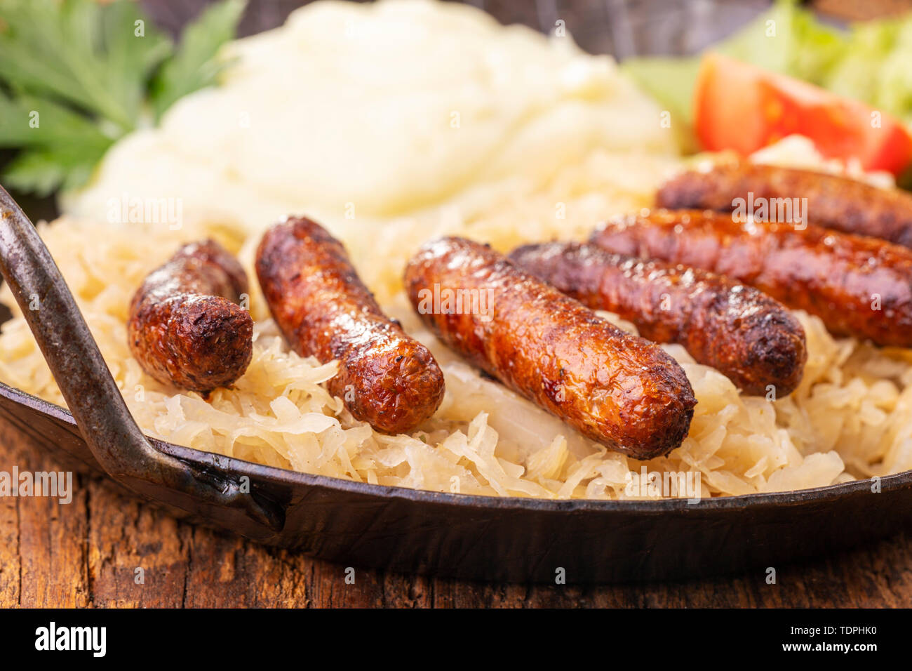 Nuremberg sausages with sauerkraut Stock Photo Alamy