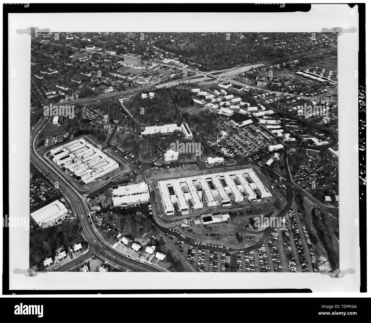 ca. 1980 (original print on file at U.S. Army Intelligence Security Command, Fort Belvoir, Virginia). AERIAL VIEW OF ARLINGTON HALL STATION. VIEW TO NORTH. - Arlington Hall Station, 4000 Arlington Boulevard, Arlington, Arlington County, VA; VanDyke, Tina, transmitter Stock Photo