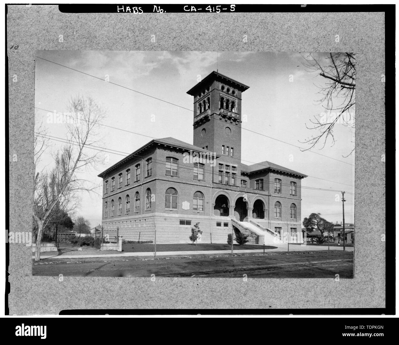 date and source unknown. West (front) and north elevations; note tower