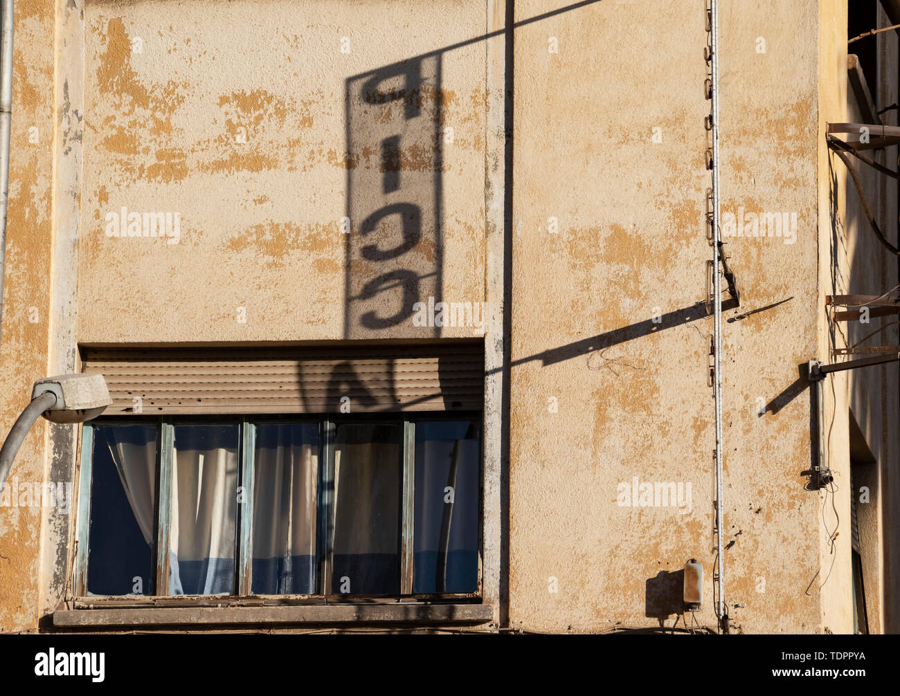 Shadow of an advertisement on a building; Asmara, Central region, Eritrea Stock Photo