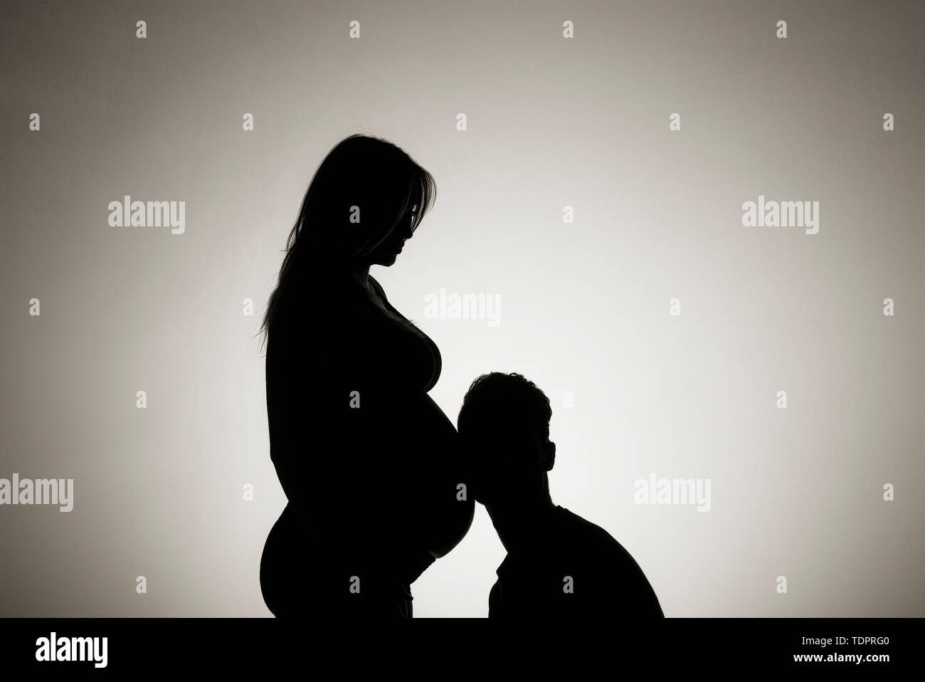 Black silhouette couple standing in hi-res stock photography and images ...