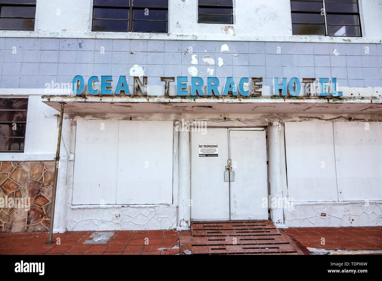 Miami Beach Florida,North Beach,Ocean Terrace,abandoned vacant empty building,blighted,boarded up,no trespassing sign,former hotel,FL190104027 Stock Photo